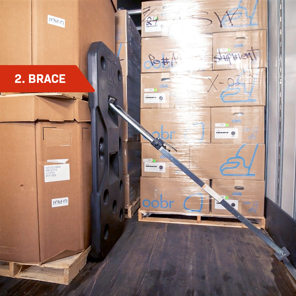 Freight Brace in position with a load bar in the top restraint option. "2. Brace" is in the top left corner.