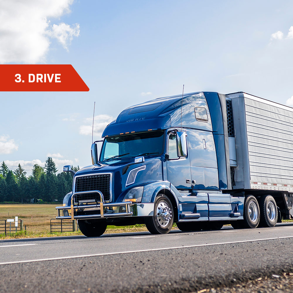 Truck driving down the road with "3. Drive" in the top left corner