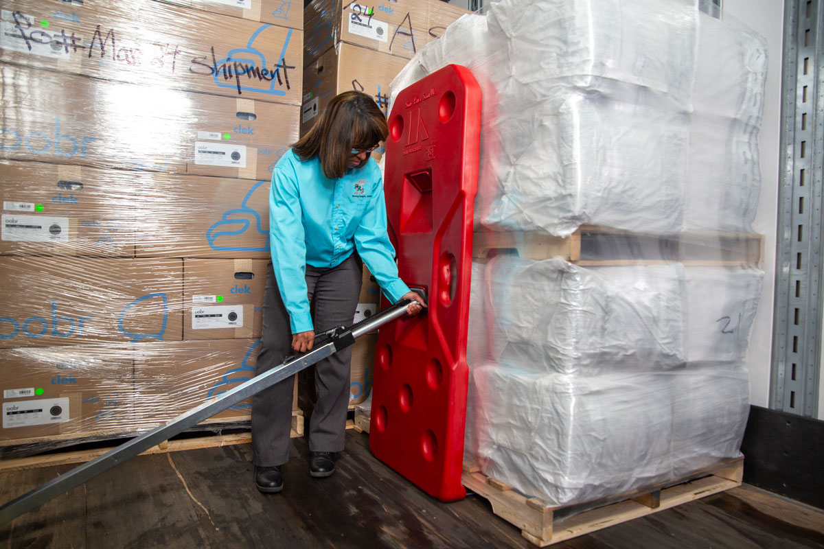 Freight Brace being installed on the lower restraint receiving section with a load bar.